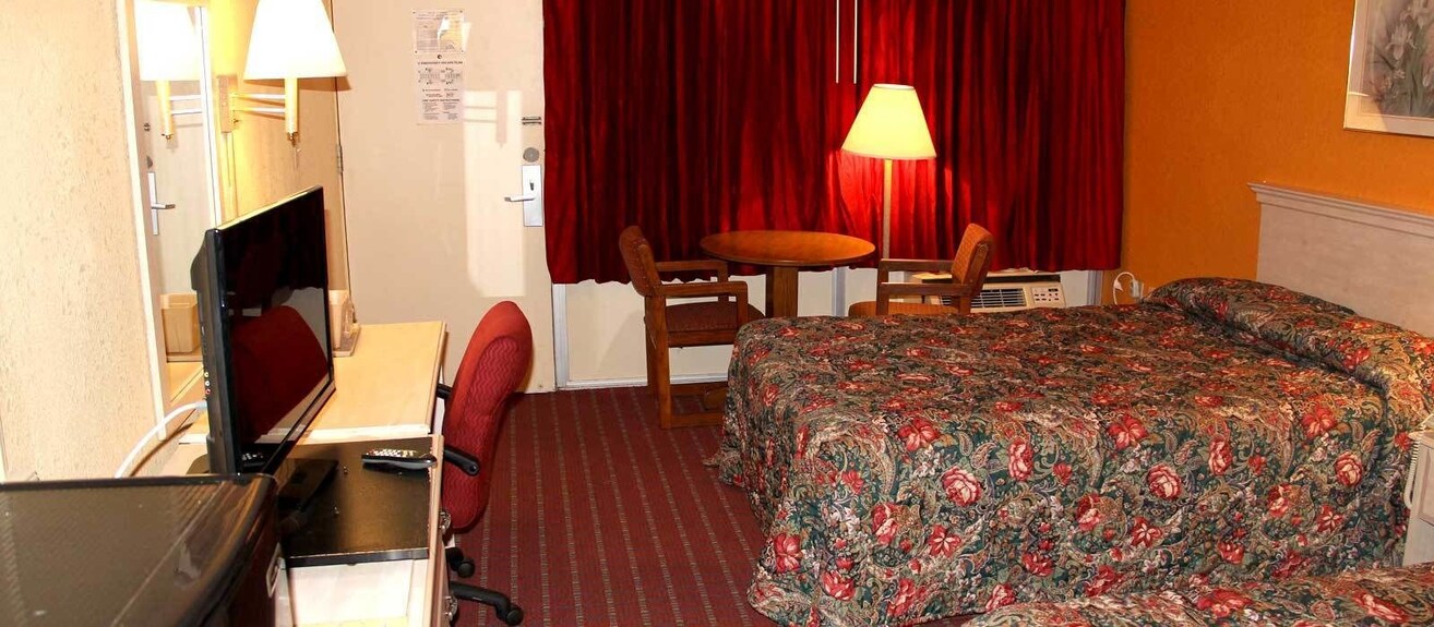 Travelers Inn room with two beds